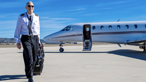 Sun Air Jets pilot Bruce Martin is seen in front a Citation X jet aircraft